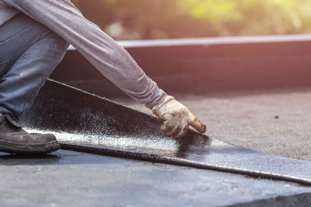 Professional Waterproofing technician working in Fletcher, OH